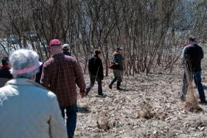 Lebanon City Council member Nicole Cormen, center, begins leading a walk of the projected route of the future Mascoma River Greenway Trail in Lebanon, N.H. on Saturday, March 30, 2013.  Valley News - Libby March